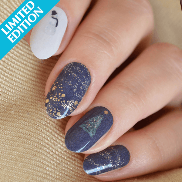 Midnight Magic nail polish wraps, navy and cream Christmas nails with gold glitter swirls and trees