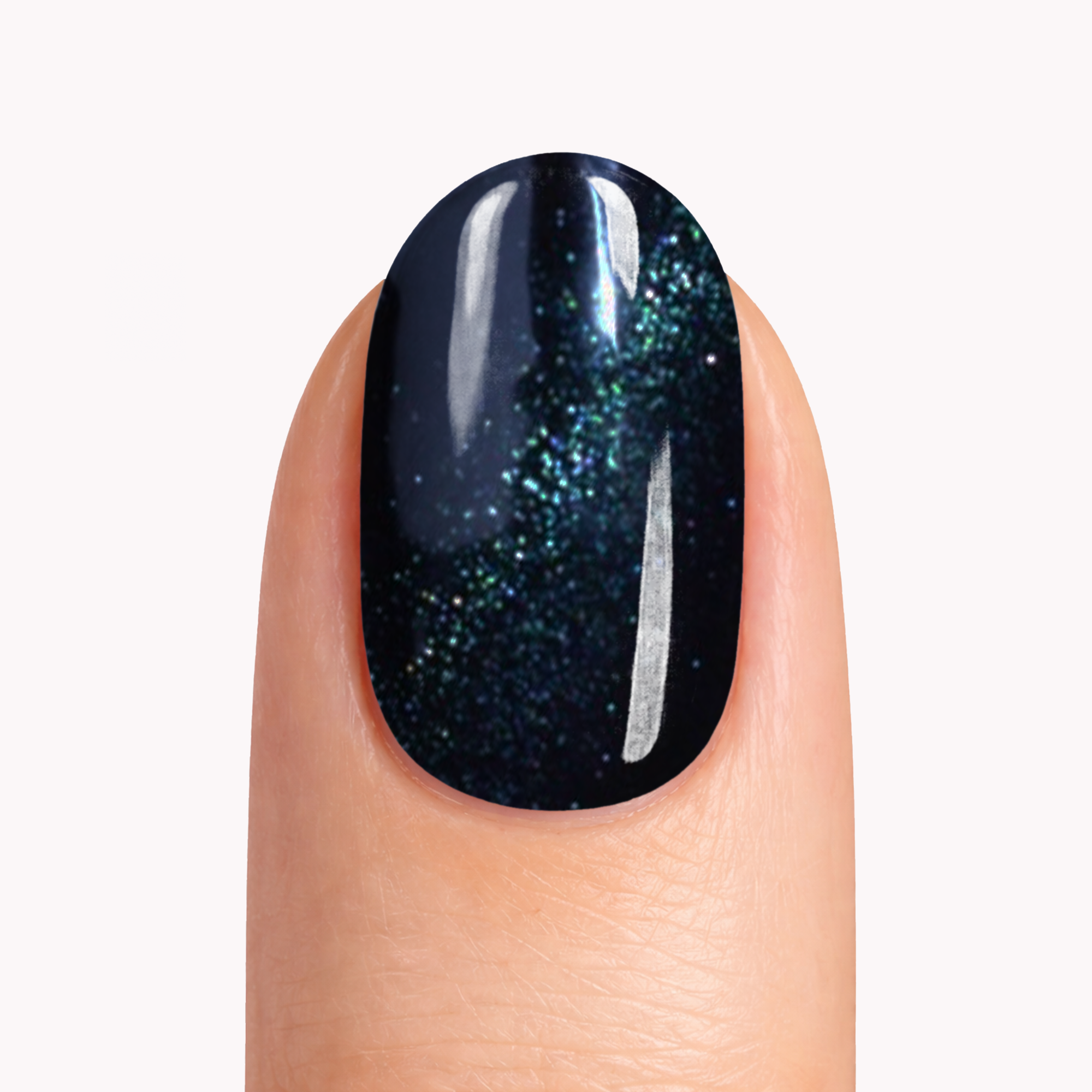 Close-up of a single nail wearing Cat Eye Midnight Super Jellies, black gel nails with a green-blue cat-eye shimmer