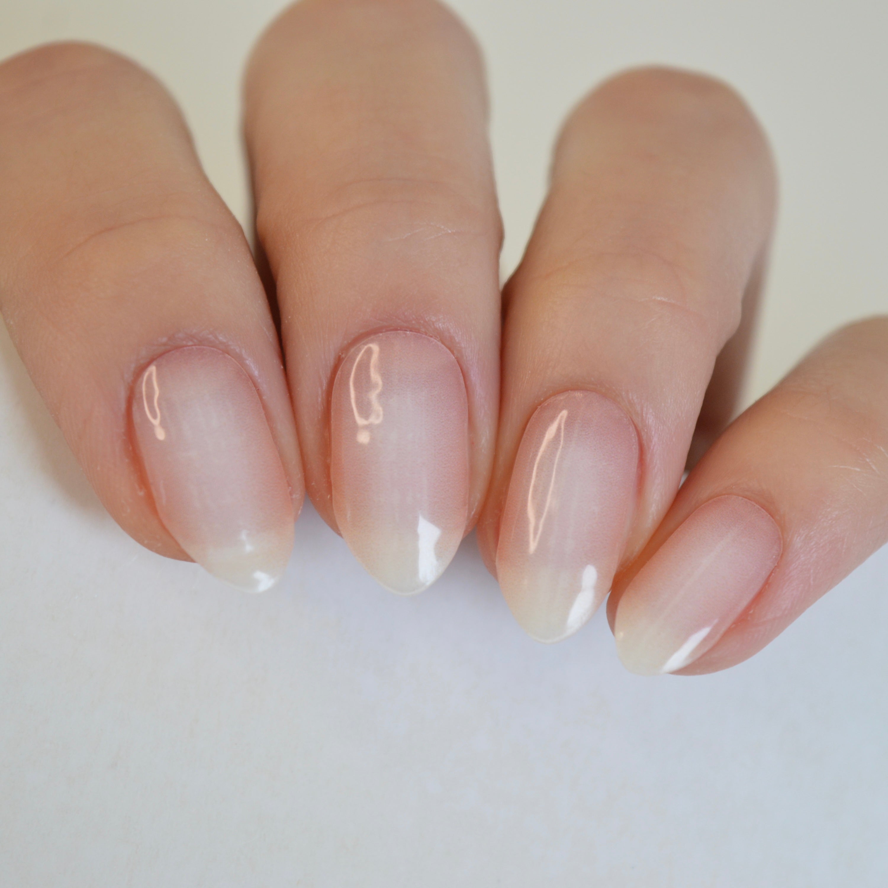 Timeless milky pink ombre gel nail wraps on nails