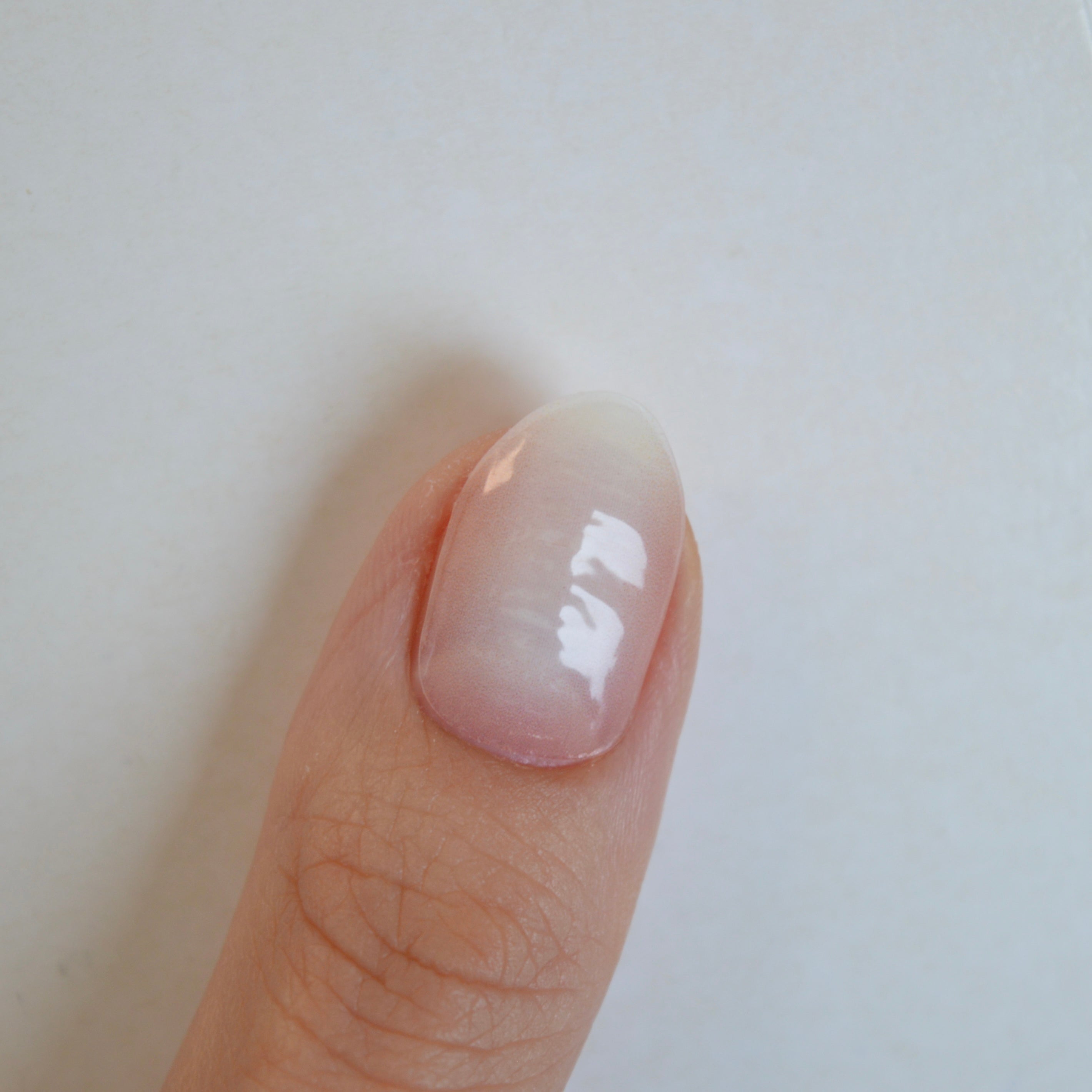 Timeless milky pink ombre gel nail wraps on nails