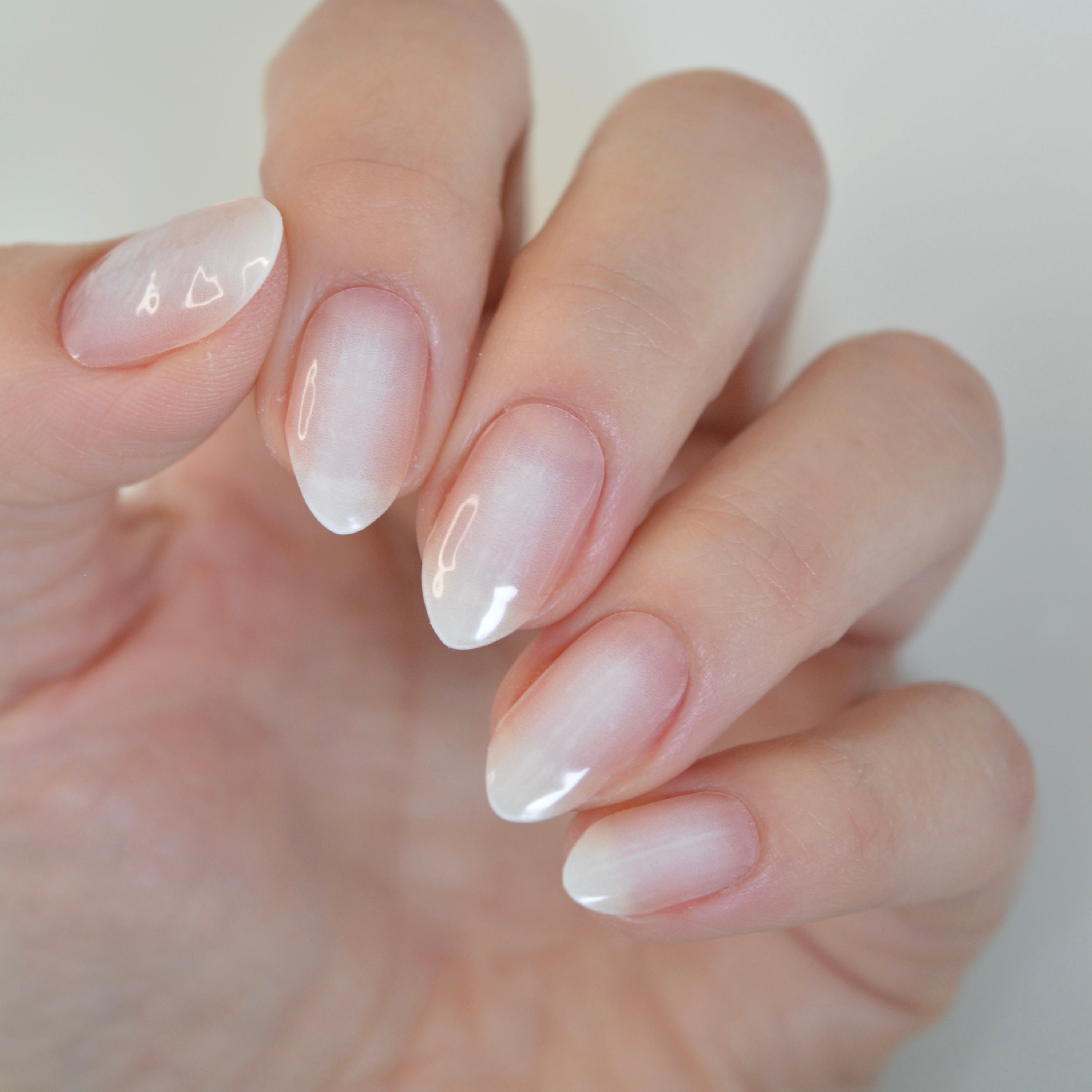 Timeless milky white to pink ombre gel nails
