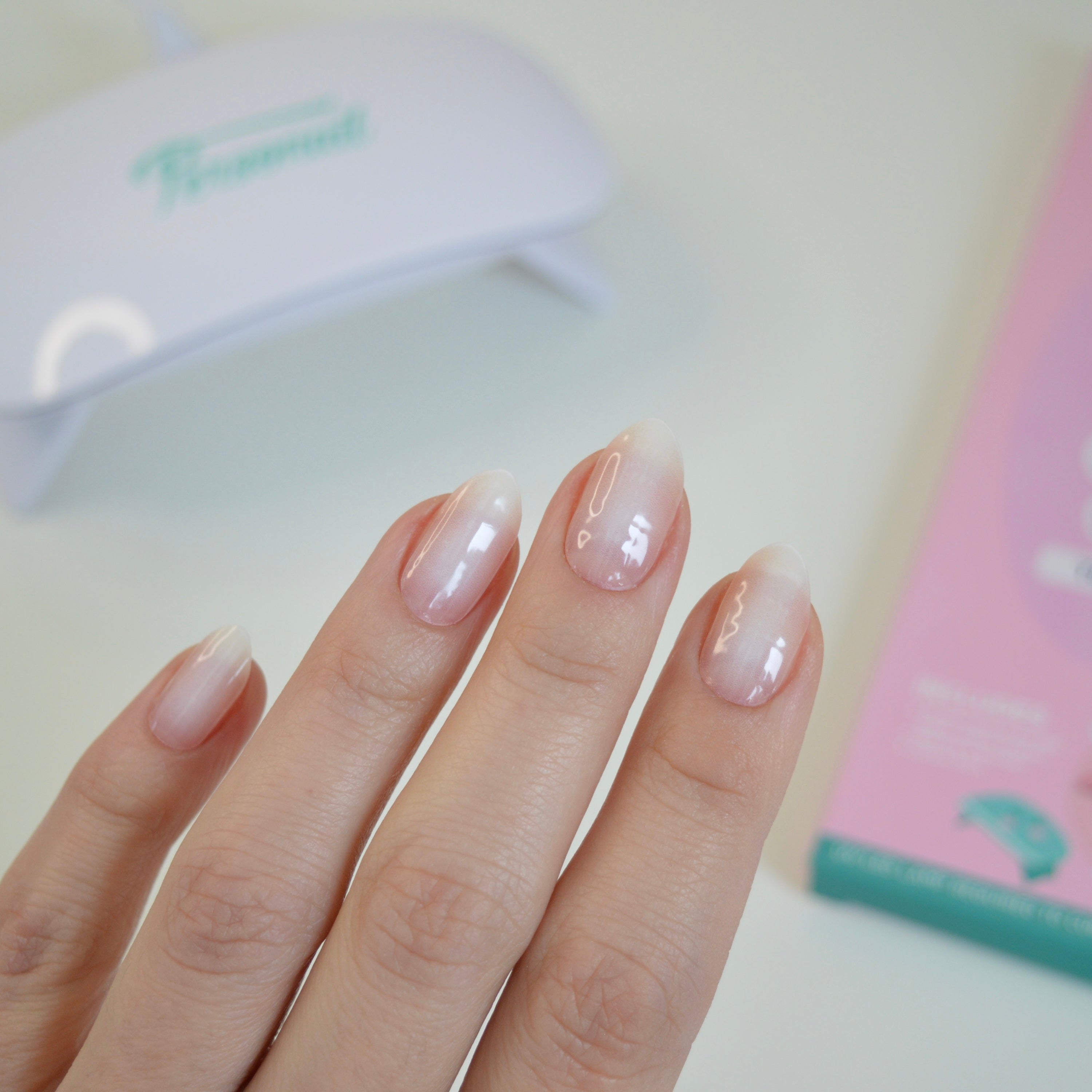 Timeless milky pink ombre gel nail wraps on nails